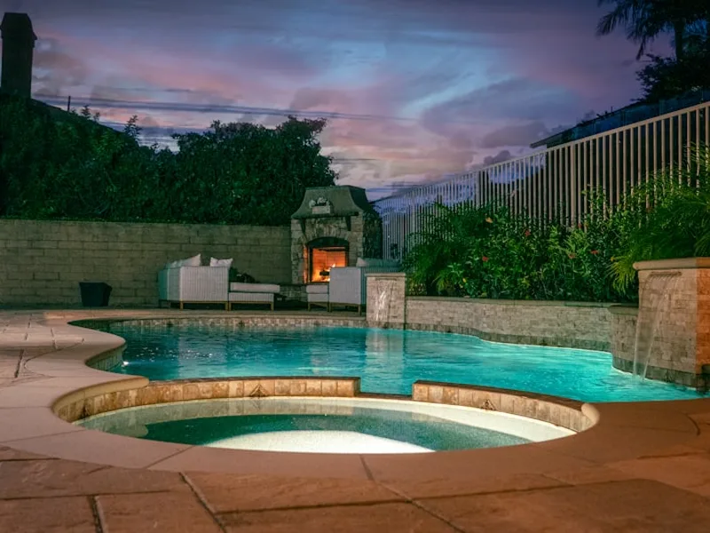 Luxury premium spa and pool with evening lighting